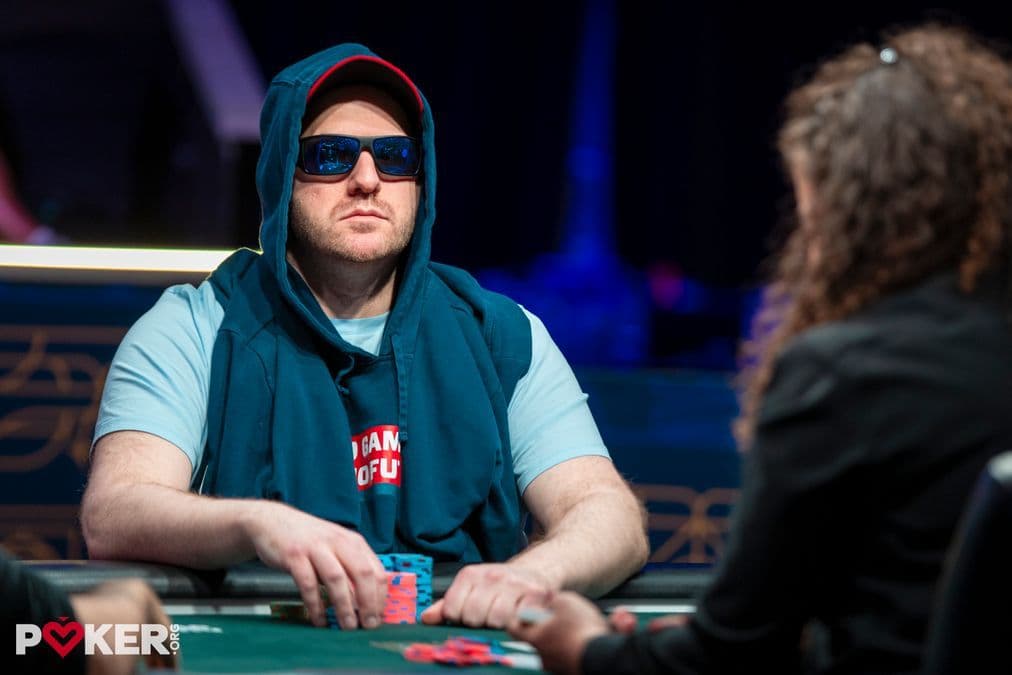 Virtual final table of the WSOP Online Colossus 2026 with chips and cards on a digital screen.