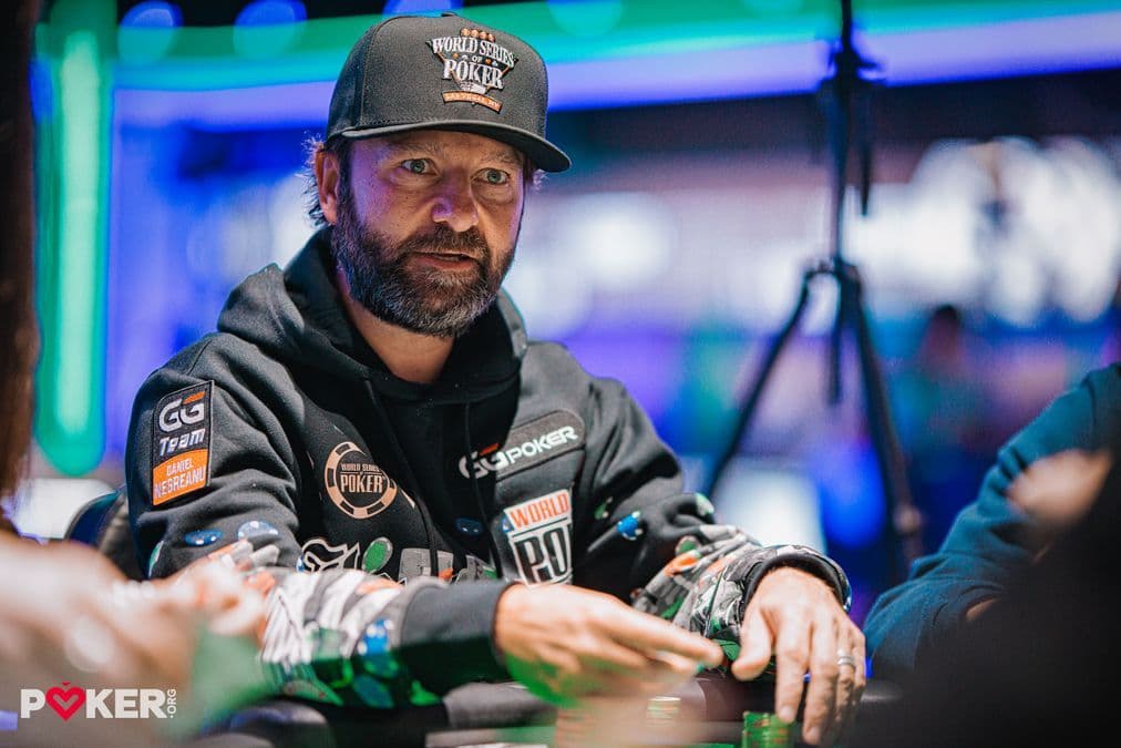 Daniel Negreanu playing online poker on a laptop in a Canadian hotel room during the WSOP Online festival