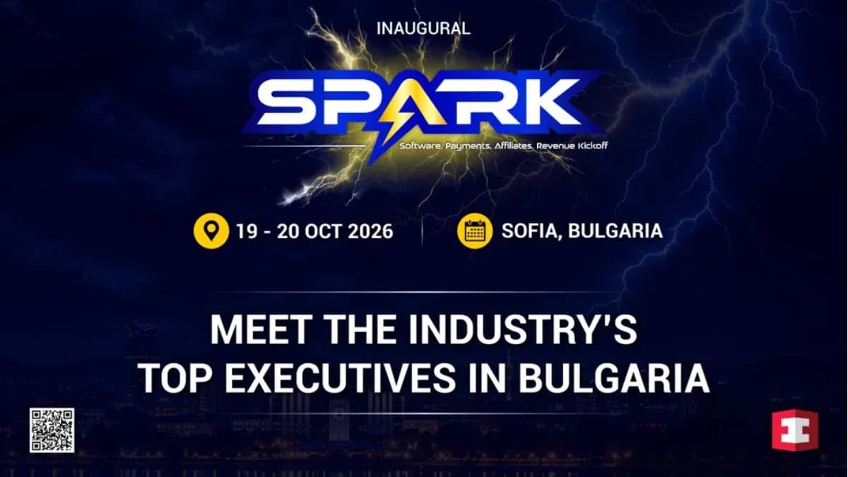 Conference hall in Sofia with speakers and delegates discussing payments, affiliates and gaming strategy