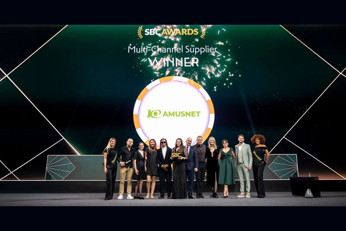 Amusnet exhibition stand at SBC Summit Lisbon with product demos, live-studio visuals and award celebration
