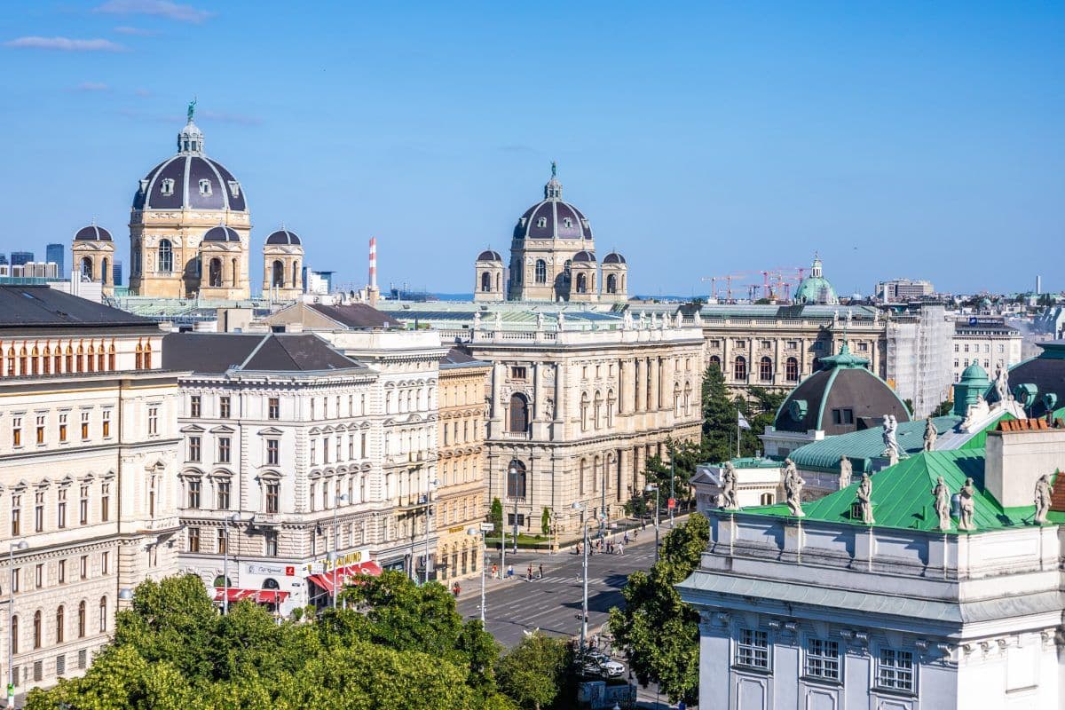 Legislative documents and a gavel over a map of Austria representing online gambling law reform