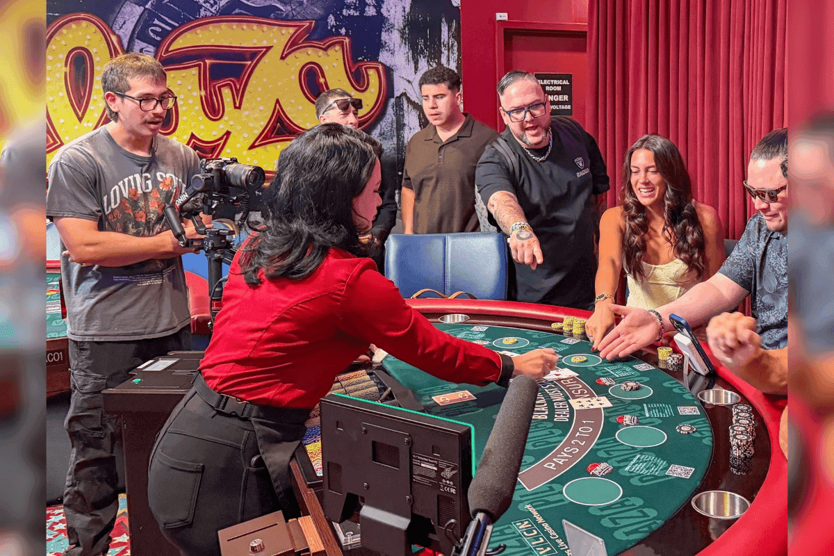 Plaza Hotel & Casino gaming room with livestream cameras and dealers preparing for on-camera table play