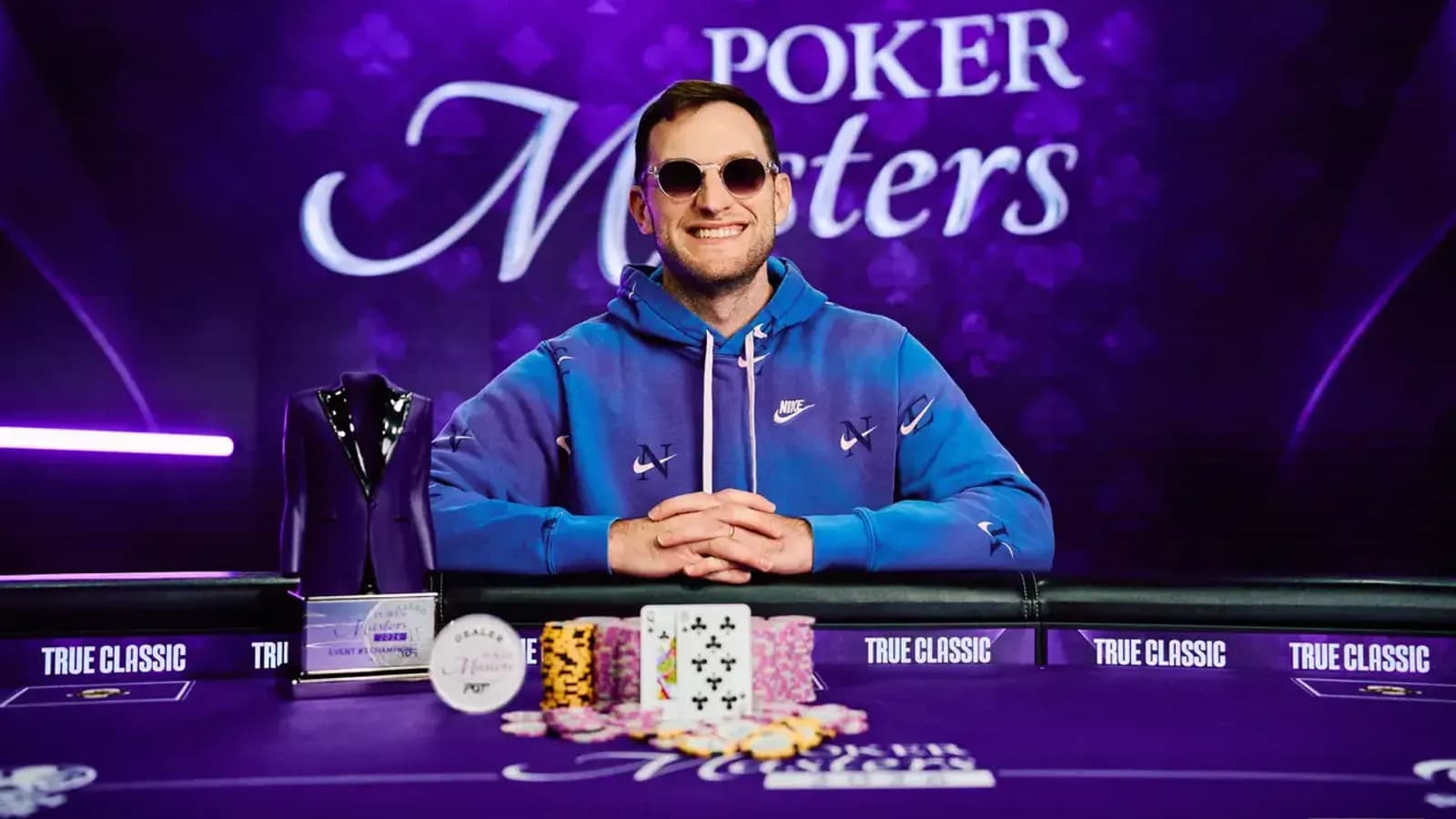 Joey Weissman celebrating at a PokerGO Tour final table with chips and cards visible, capturing his fifth PGT title