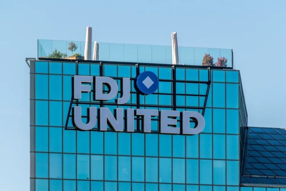 FDJ United financial results document with stock price chart and EuroMillions lottery balls