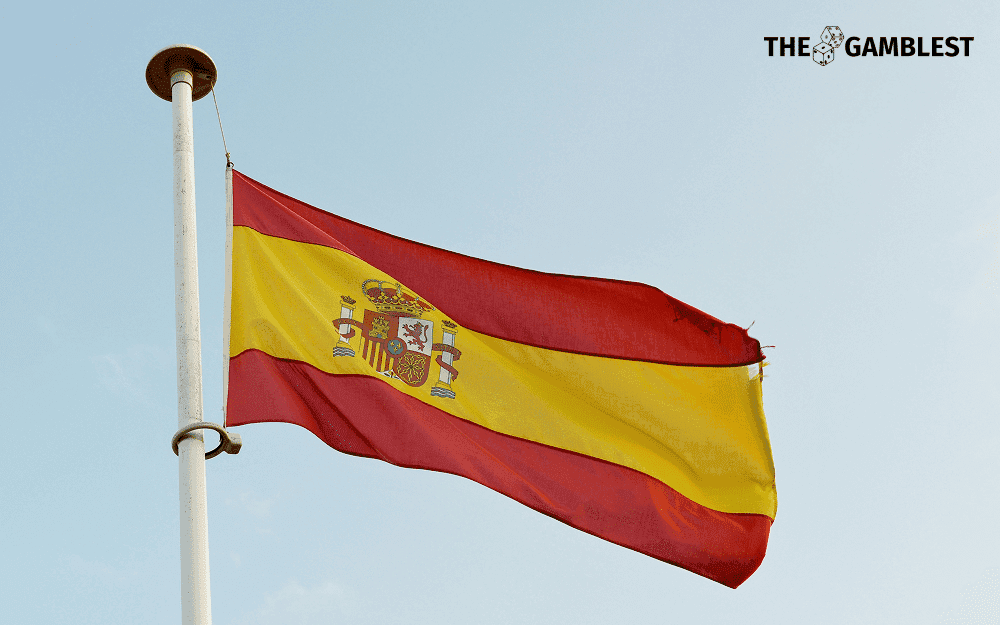 Screenshot-style graphic of Spain map, regulatory interface and deposit limit figures €700 €1,750 €3,300