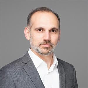Damien Raymond — COO, Sharp Vision
